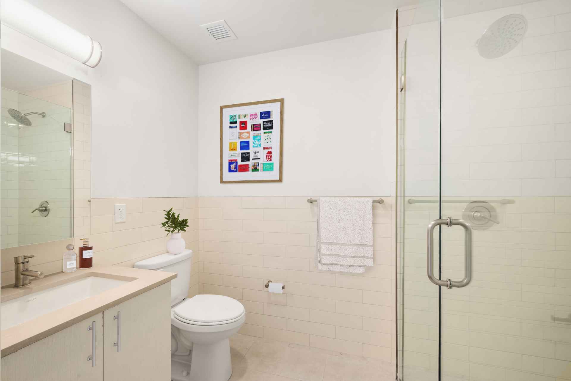 Modern bathroom at Tryon North, new apartments for rent in Inwood, NYC.